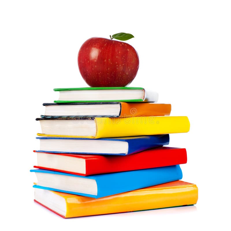 Books tower with apple isolated on white