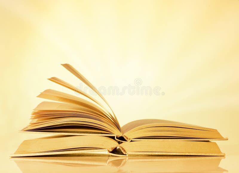 Books on yellow background