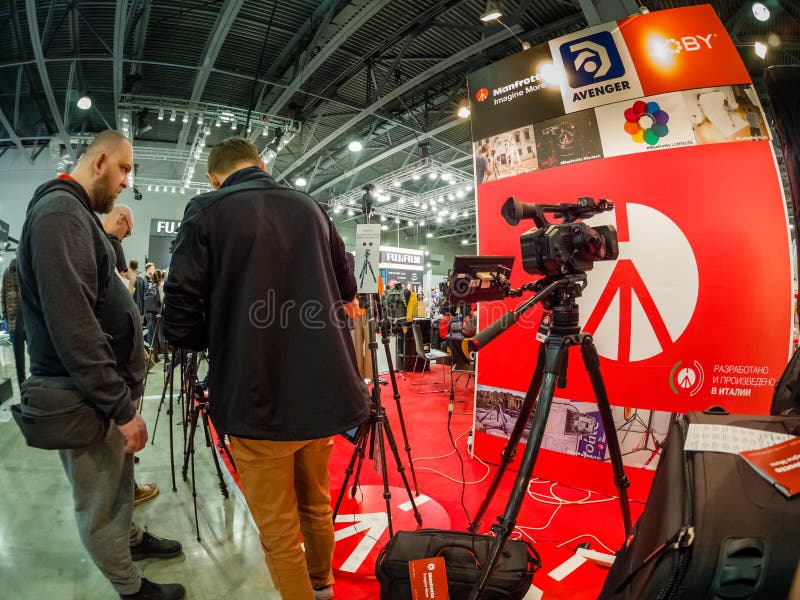 MOSCOW, RUSSIA - APRIL 13, 2018: Booth of Manfrotto and Joby companies at PhotoForum 2018 trade show and exhibition in Moscow, Russia on April 13, 2018.