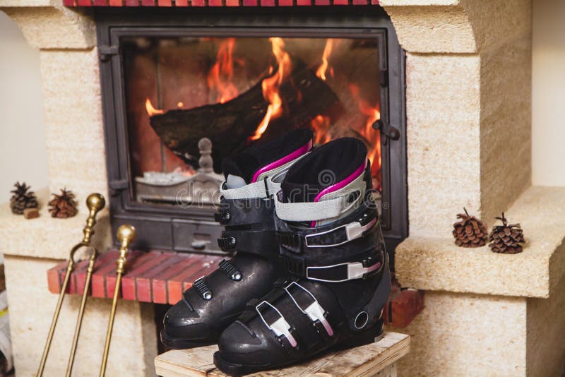 Boots Ski Boots in Front of Fireplace Stock Photo Image of couple, fireplace 126850316