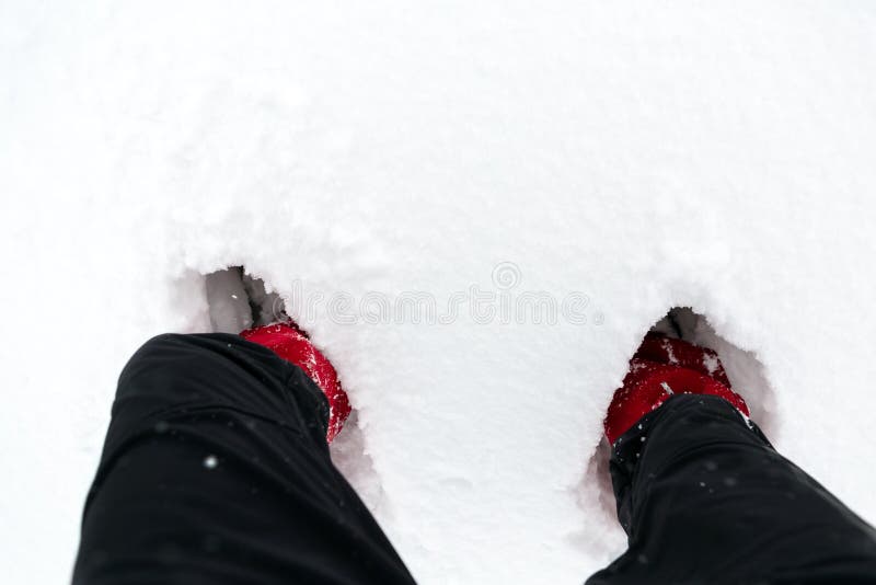Boots in snow, shoes on a white snow during hiking in winter royalty free stock photo Boots in snow, shoes on a white snow during hiking in winter royalty free stock photo