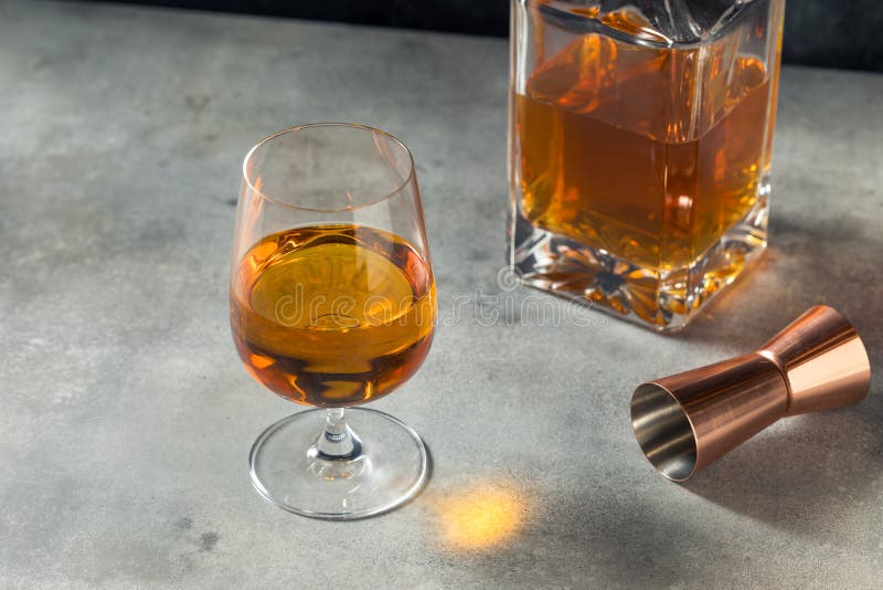 Boozy Whiskey in a Snifter Glass Stock Photo Image of rustic, scotch