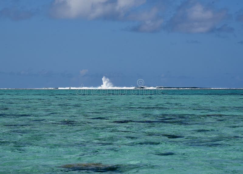 Waves breaking over a coral barrier of the French Polynesian island of Bora Bora. Waves breaking over a coral barrier of the French Polynesian island of Bora Bora.