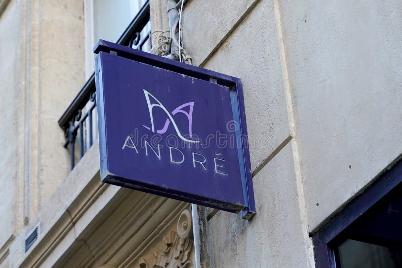 Andre Sign Brand and Text Logo Shoes Store Fashion Apparel and Footwear ...