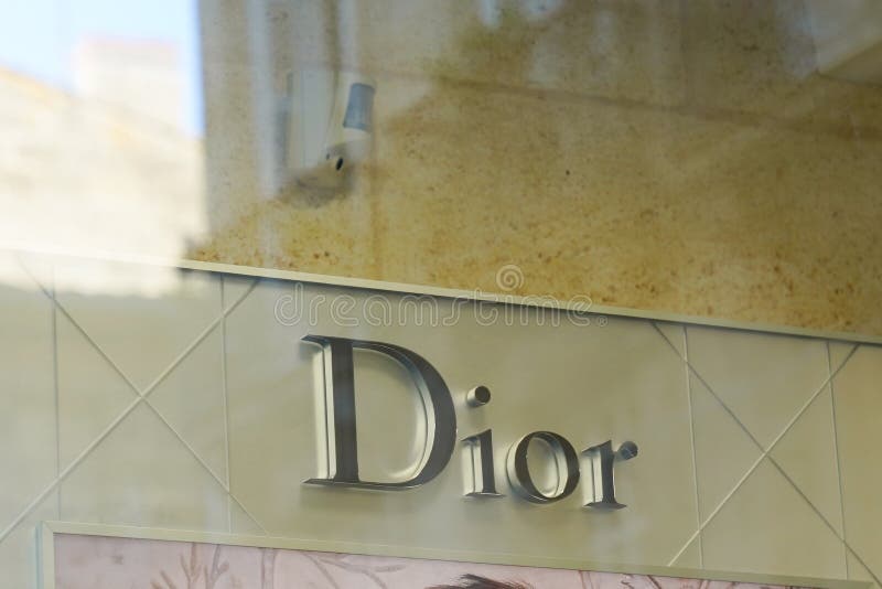 Christian Dior brand logo of company text sign wall of fashion clothing  industry facade of retail shop and store Stock Photo