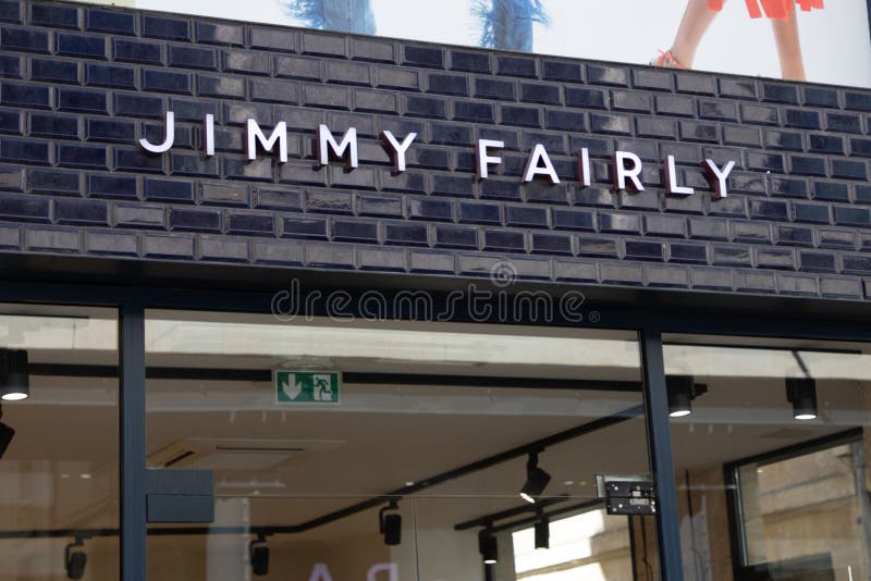 Jimmy Fairly Sign Text and Logo Brand on Wall Facade Entrance on ...