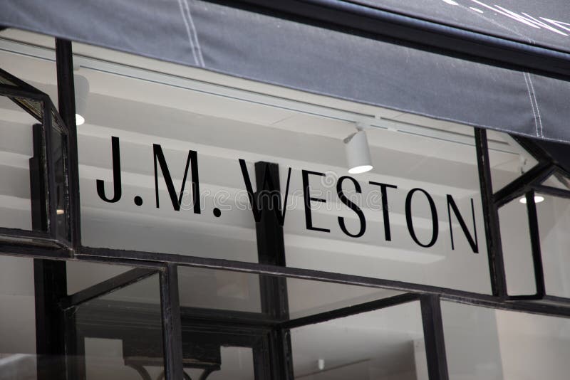 Jm Weston Shop Brand Logo and Boutique Chain Text Sign Front Wall ...