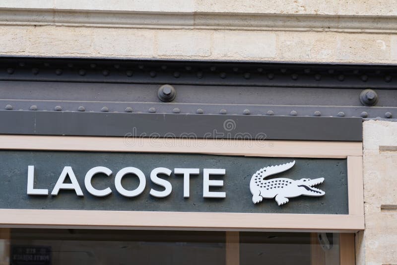 lacoste metal logo