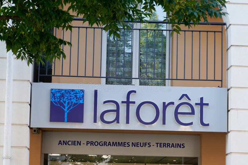 Laforet Sign Logo And Text Brand In Agency Of Real Estate Red Store ...