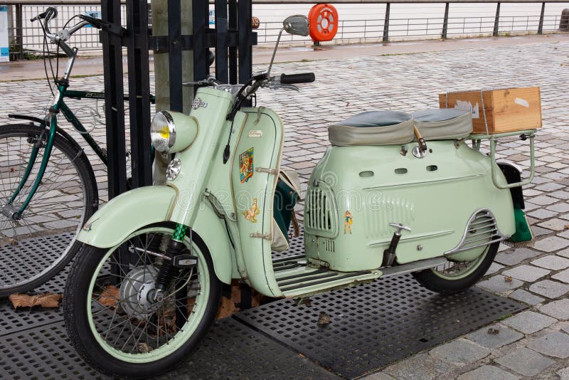 Bordeaux , Aquitaine / France - 06 01 2020 : manurhin vintage scooter parked in the street in France royalty free stock photo Bordeaux , Aquitaine / France - 06 01 2020 : manurhin vintage scooter parked in the street in France royalty free stock photo