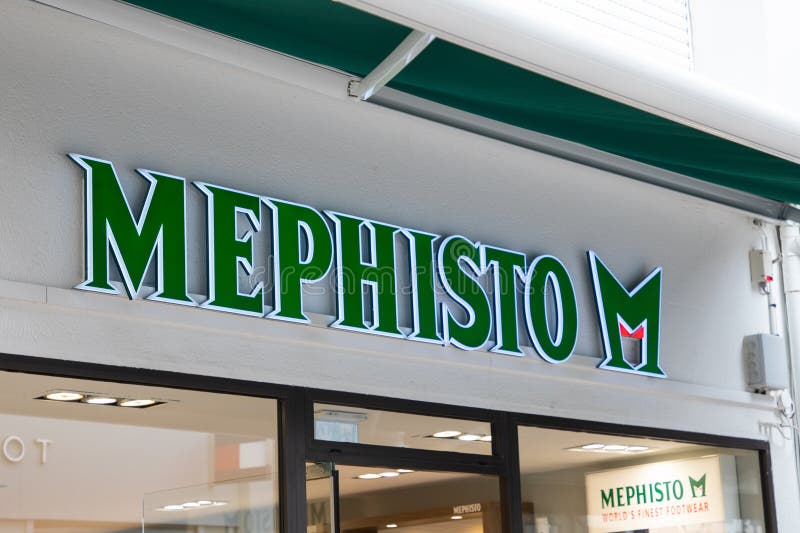 Mephisto Boutique Brand Logo and Sign Text on Wall Facade Entrance ...