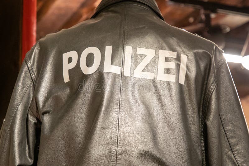 Polizei Text Sign on the Back of German Police Man Wearing Leather ...