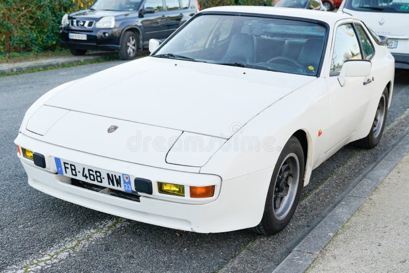 Bordeaux , Aquitaine / France - 03 03 2020 : Porsche 944 old timer vintage white sports car in street royalty free stock images Bordeaux , Aquitaine / France - 03 03 2020 : Porsche 944 old timer vintage white sports car in street royalty free stock images