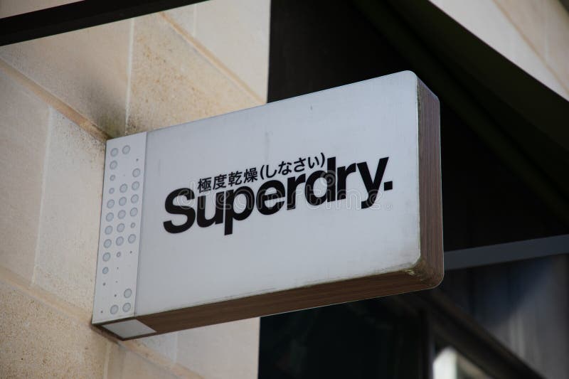 Superdry Logo Brand and Text Sign on Wall Facade Storefront Fashion ...