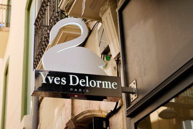Yves Delorme Home Shop Brand Logo and Sign Text of Bedding House on ...
