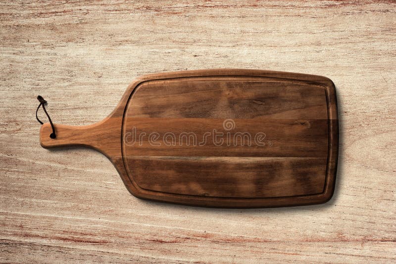 Bordo del servizio del pane sul fondo di legno della tavola immagine stock Bordo del servizio del pane sul fondo di legno della tavola immagine stock