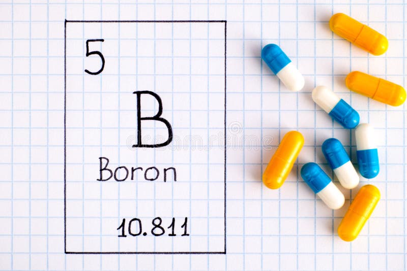 Bore B d'élément chimique d'écriture avec des pilules images libres de droits Bore B d'élément chimique d'écriture avec des pilules images libres de droits