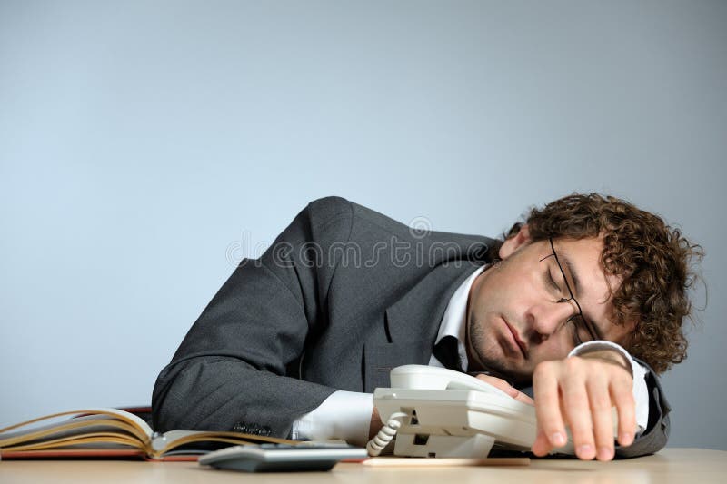 Horizontal image of bored young businessman. Horizontal image of bored young businessman