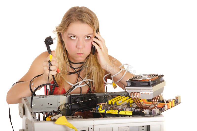 Bored woman repairing computer royalty free stock images