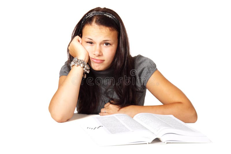 Bored woman studying stock image