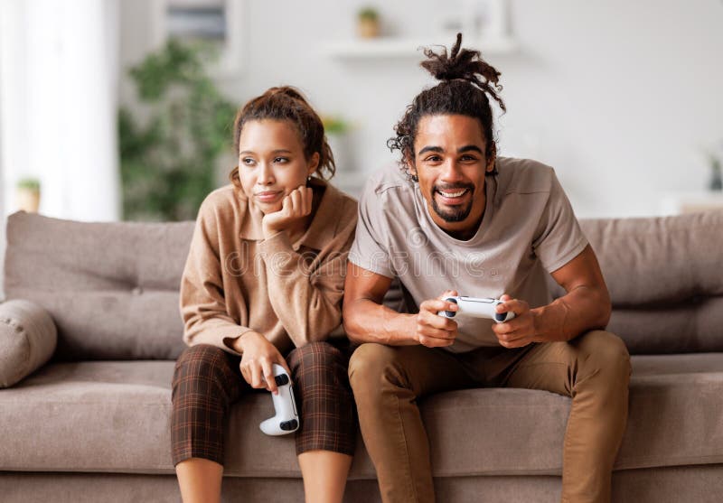 Boring Date. Excited Black Guy Playing Video Games and Ignoring Girlfriend  Next To Him Stock Image - Image of enjoy, conflict: 188745699