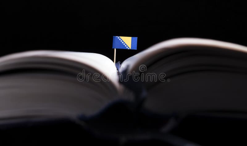 Bosnia and Herzegovina flag in the middle of the book. royalty free stock photography