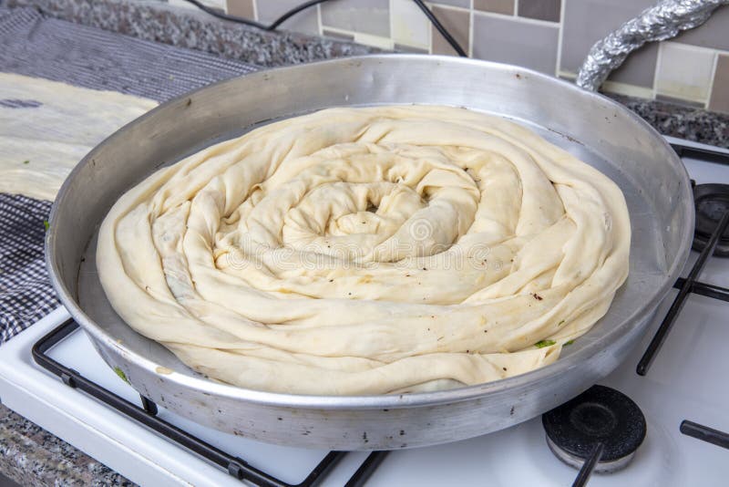 Bosnian borek. Homemade rolled borek, spinach, potato and feta cheese, turkish cuisine. Turkish Culture Ramadan and Eid-Adha