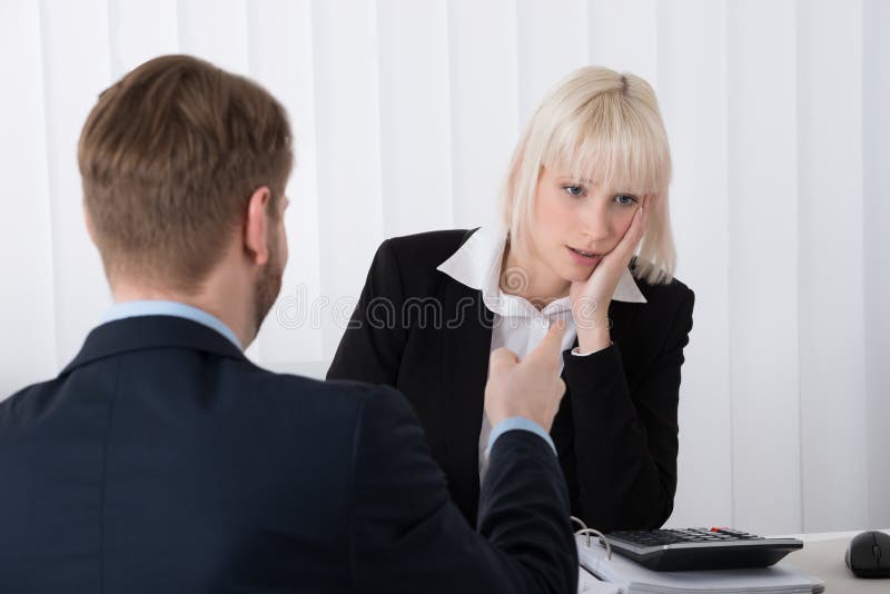 Boss Blaming Female Employee For Bad Results royalty free stock photos Boss Blaming Female Employee For Bad Results royalty free stock photos