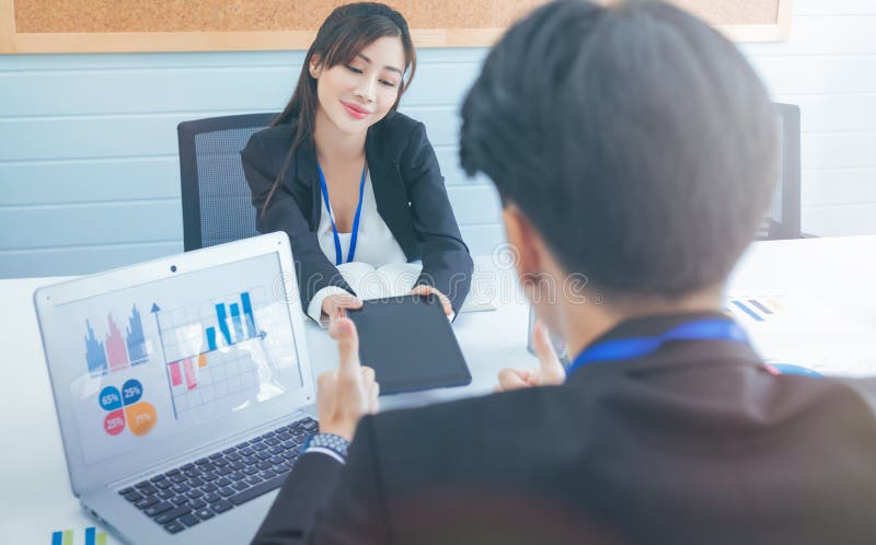 Boss checking office work on tablet for contract and agreement from secretary concept stock photos
