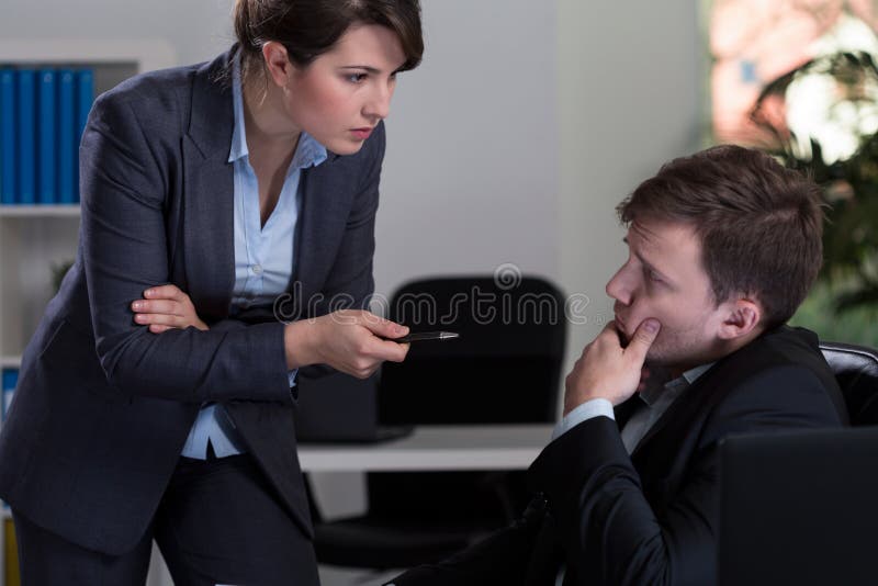 Boss threatening her employee