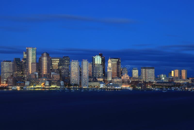 Fantastic Boston skyline in the blue hour. The picture was taken from the opposite side of the bay close to the airport in the early morning hour - shortly before sunrise. Fantastic Boston skyline in the blue hour. The picture was taken from the opposite side of the bay close to the airport in the early morning hour - shortly before sunrise.