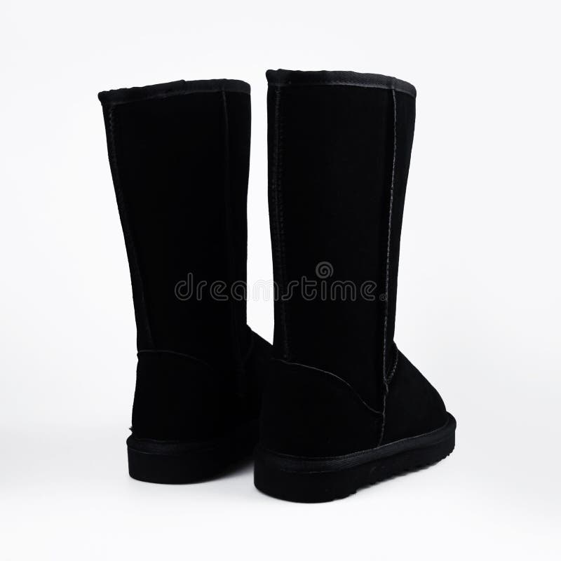 Botas Negras Invierno De La Moda Foto de archivo de vertical, anaranjado: 75861140