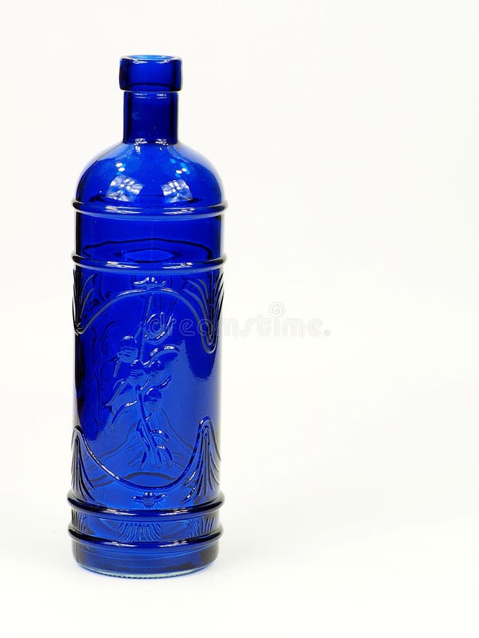 Menos Jirafa identificación Botella de cristal azul foto de archivo. Imagen de cristal - 51344166