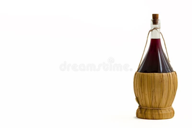 Botella vieja de vino rojo imágenes de archivo libres de regalías Botella vieja de vino rojo imágenes de archivo libres de regalías