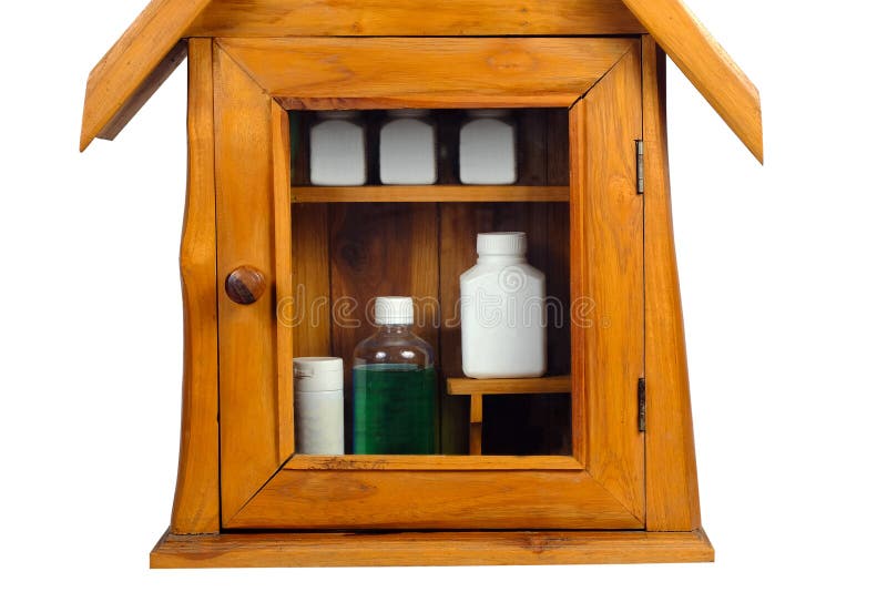 Botiquín de madera con las drogas imágenes de archivo libres de regalías Botiquín de madera con las drogas imágenes de archivo libres de regalías