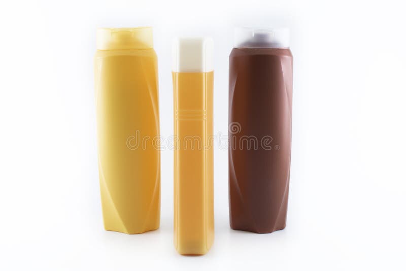 Bottiglia di fucilazione dello sciampo Fondo astratto nel colore bianco È stato contenuto lo studio immagini stock libere da diritti Bottiglia di fucilazione dello sciampo Fondo astratto nel colore bianco È stato contenuto lo studio immagini stock libere da diritti