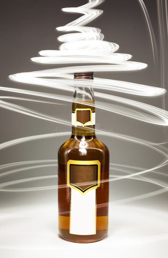 Bottle of alcoholic drink and magical light