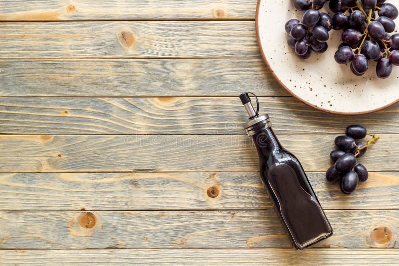 Bottle of Balsamic Vinegar with Bunch of Fresh Grapes Stock Image Image of food, wine 228130779