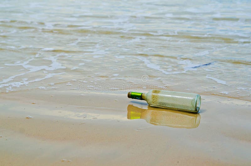 Bottle on beach stock photo. Image of message, bottle 32378290