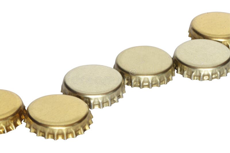 Golden beer bottle caps stock image. Image of closeup 6406613