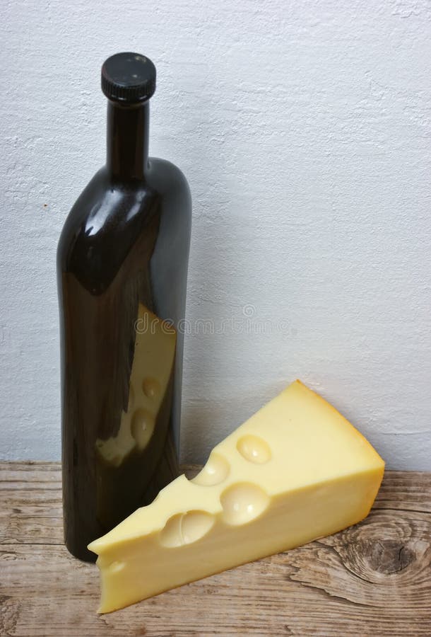 Bottle and cheese stock photo. Image of bottle, still 14631426