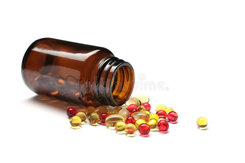 Bottle with different vitamin capsules
