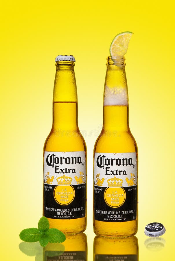 Bottle of fresh beer, cold beer Corona Extra lime and mint.