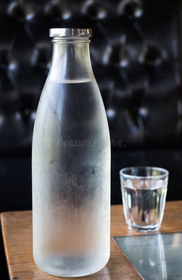 Bottle and Glass Cold Water Stock Photo Image of backgrounds, glass