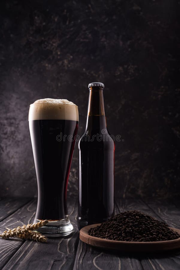 Download Bottle And Glass Of Dark Beer Stock Photo Image Of People Indoor 26929486 Yellowimages Mockups