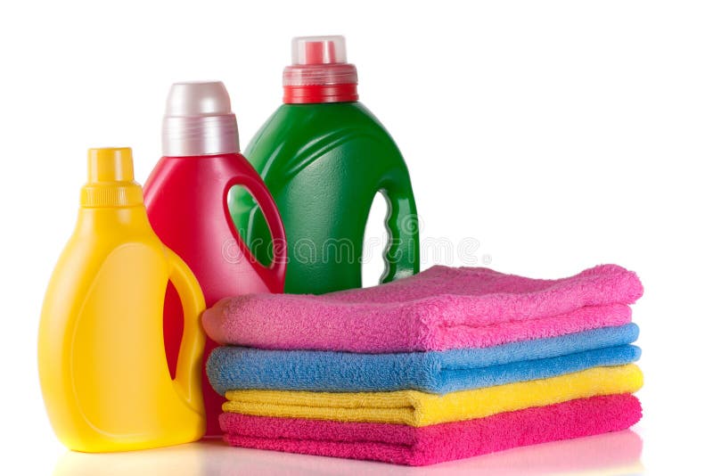 Bottle Laundry Detergent and Conditioner with Towels Isolated on White