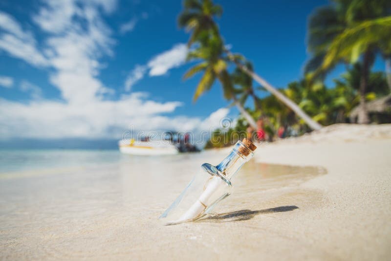 Bottle with a message on a tropical island beach Saona. Dominican Republic, Punta Cana.