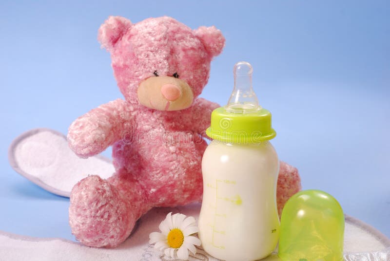 Teddy Bear With A Bottle Of Milk Stock Photo - Image of background, small: 50376940