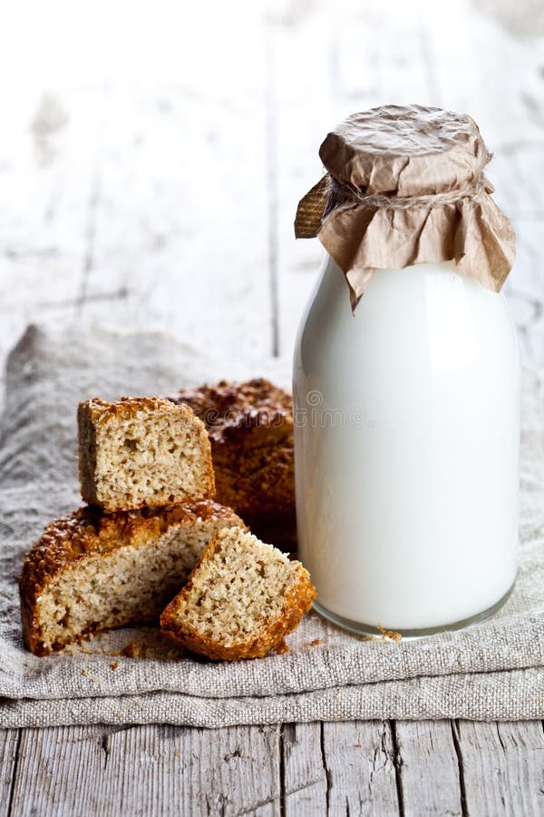 Bottle of milk and fresh baked bread