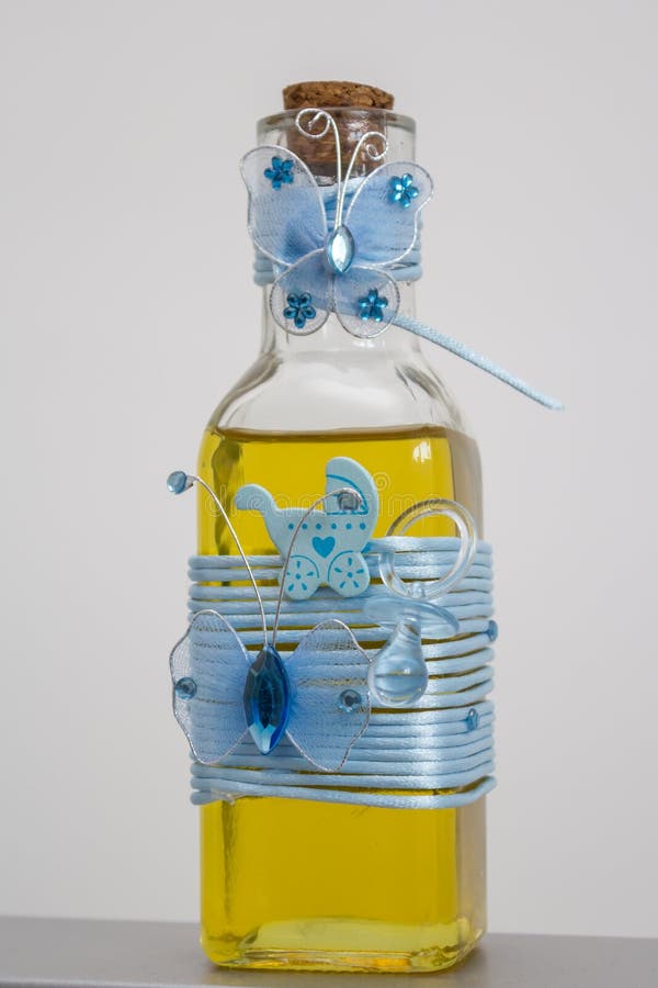 Bottle with oil for christening